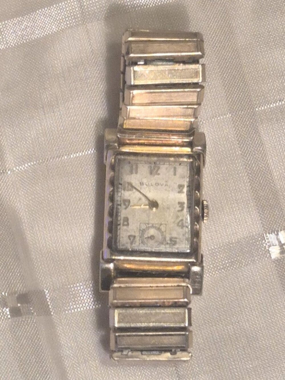 Bulova vintage 1940s–1950s Bulova rectangular tank watch with a 10K gold-filled